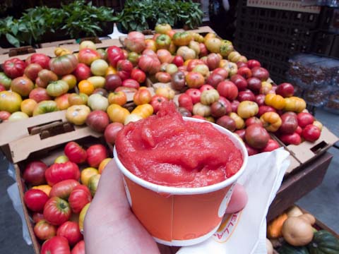 Blood orange gelato with heirloom tomatos in the background