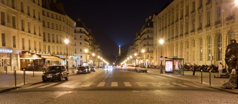 I've always liked this view and it's one of the reasons for staying at this hotel.  At the end of the street is the Jardin du Luxembourg and behind that in the distance is the Eiffel Tower.