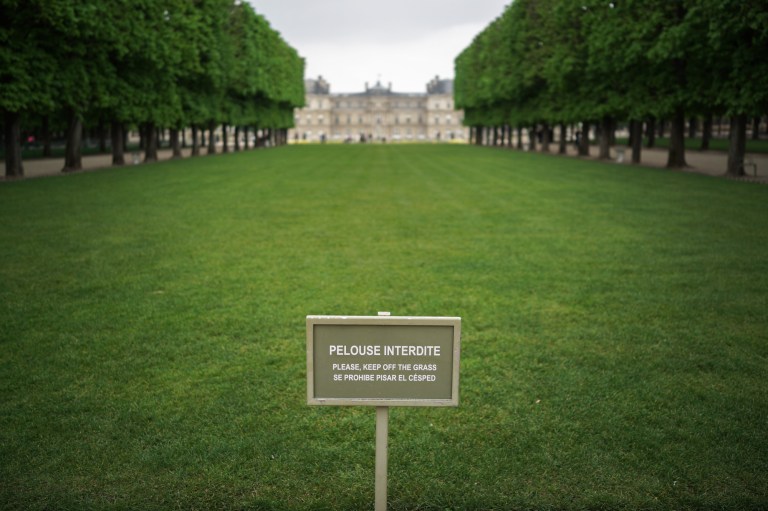 There are three large rectangular plots of grass in the front of Luxembourg Gardens and they rotate which piece you're allowed to sit on on different days.  This one isn't one of your choices today.