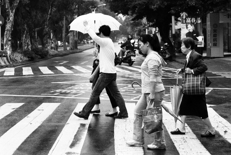 Crossing in the rain. Taipei, Taiwan