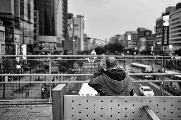 Sitting above the street in Ximending. Ximending is a great starting point when visiting Taipei.
