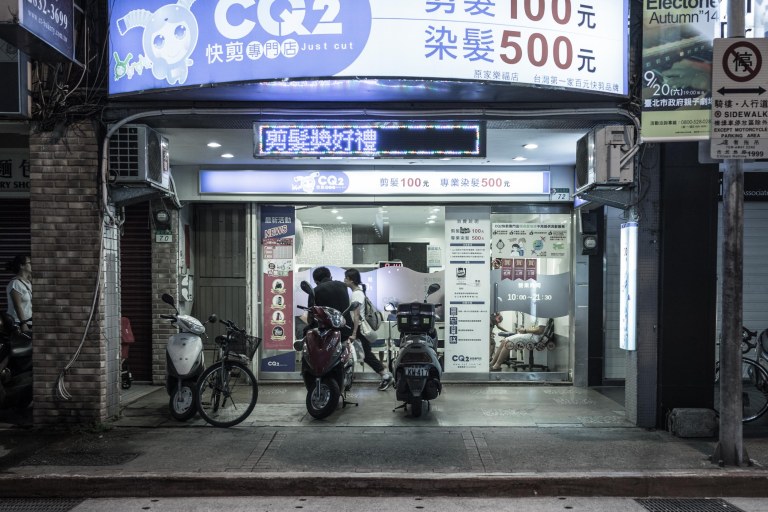 When I look at this scene the first thing I see are a lot of empty scooter parking spaces.