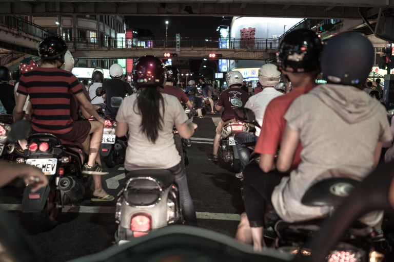 The view  from my scooter at one of the stoplights on the way to the camera store.