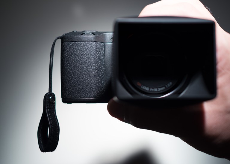 A look at the finger strap and the GR with the GH-3 Hood.