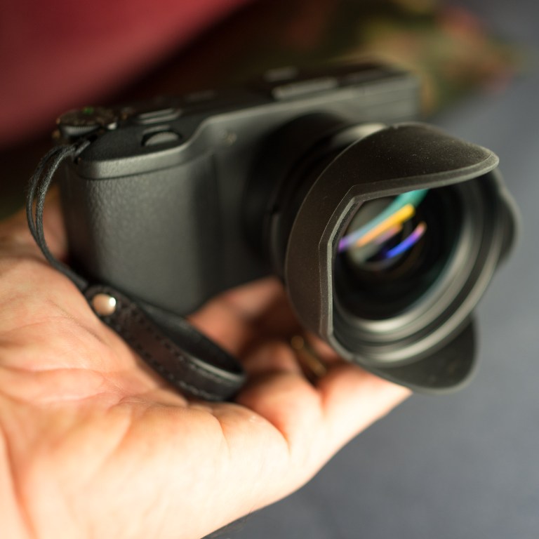 Front view of the GW-3 conversion lens attached to the Ricoh GR.