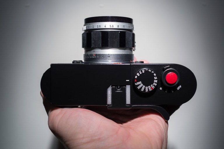 It's not a very big lens and has minimal viewfinder blockage.