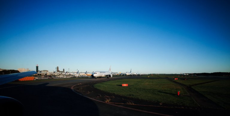 Lined up for takeoff from Narita International Airport, Tokyo. (Ricoh GR with 21mm wide angle adapter)